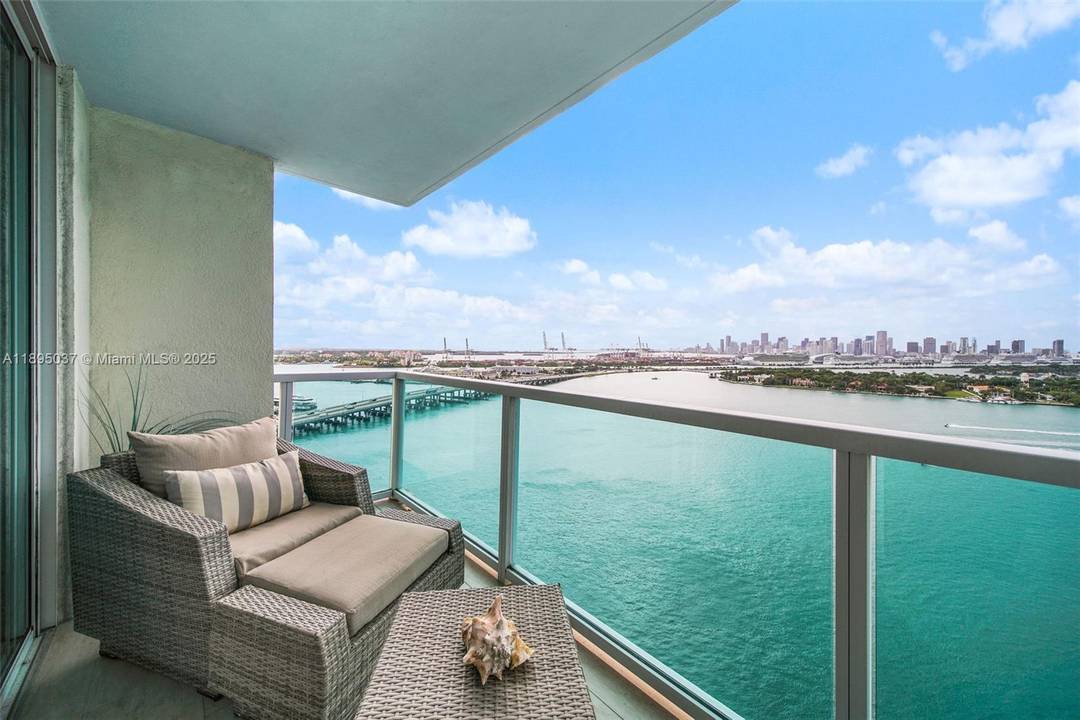 Enjoy breathtaking direct bay views of the Miami Skyline and stunning sunsets from this redesigned residence at The Floridian.