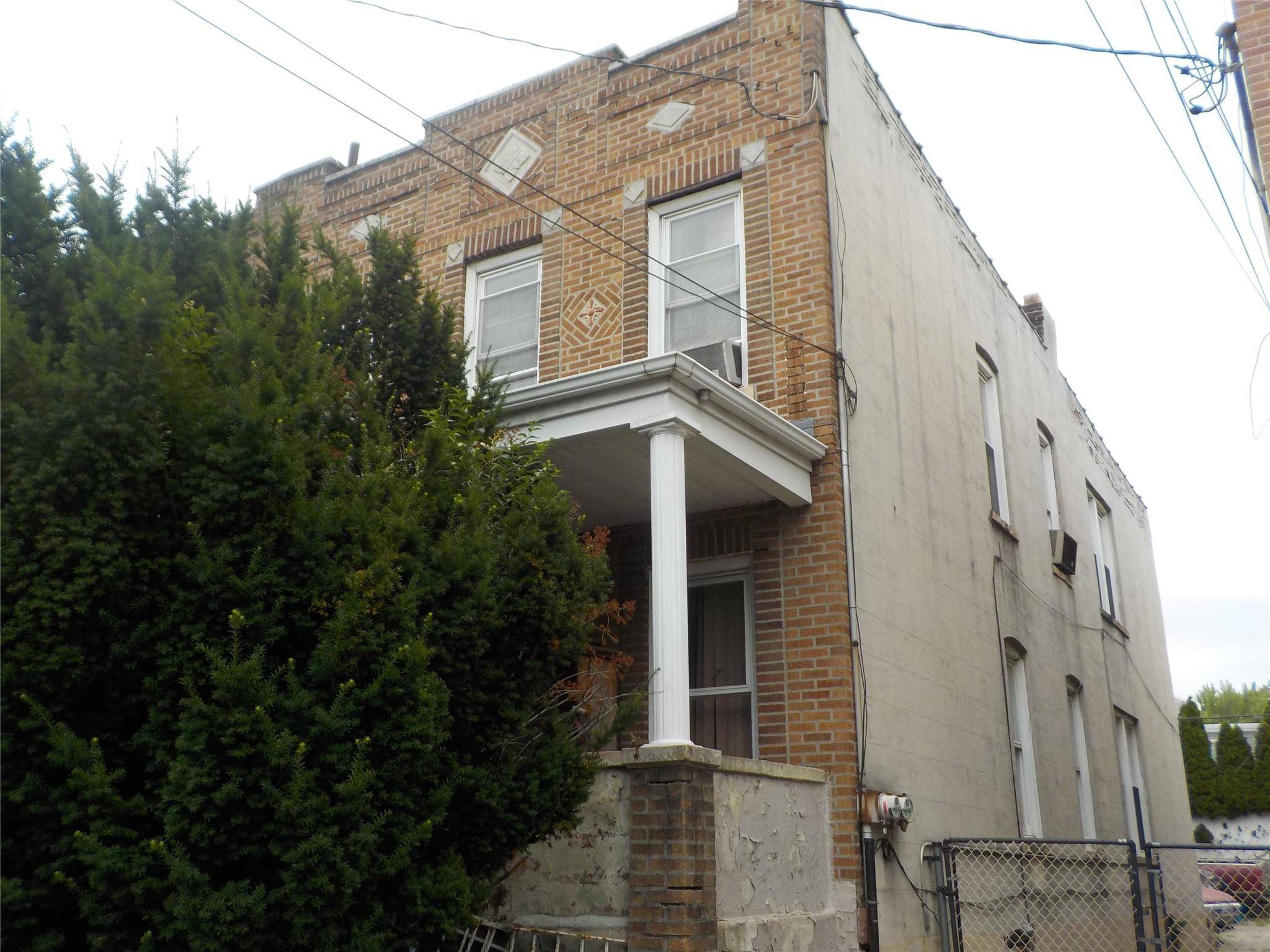 Multi family semi attached home in Middle Village, offering approximately 2, 000 sq.