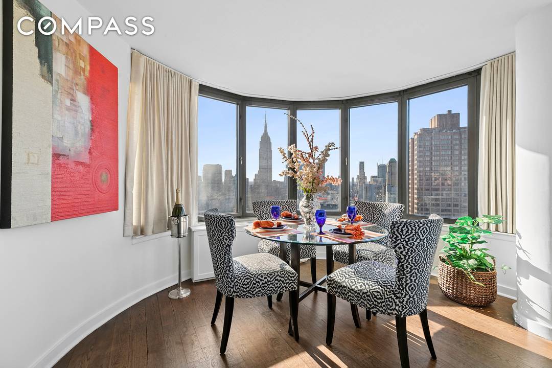 Experience luxury living in this elegantly renovated 2 bedroom, 2 bathroom residence on the 50th floor of The Corinthian, a full service, white glove condominium.