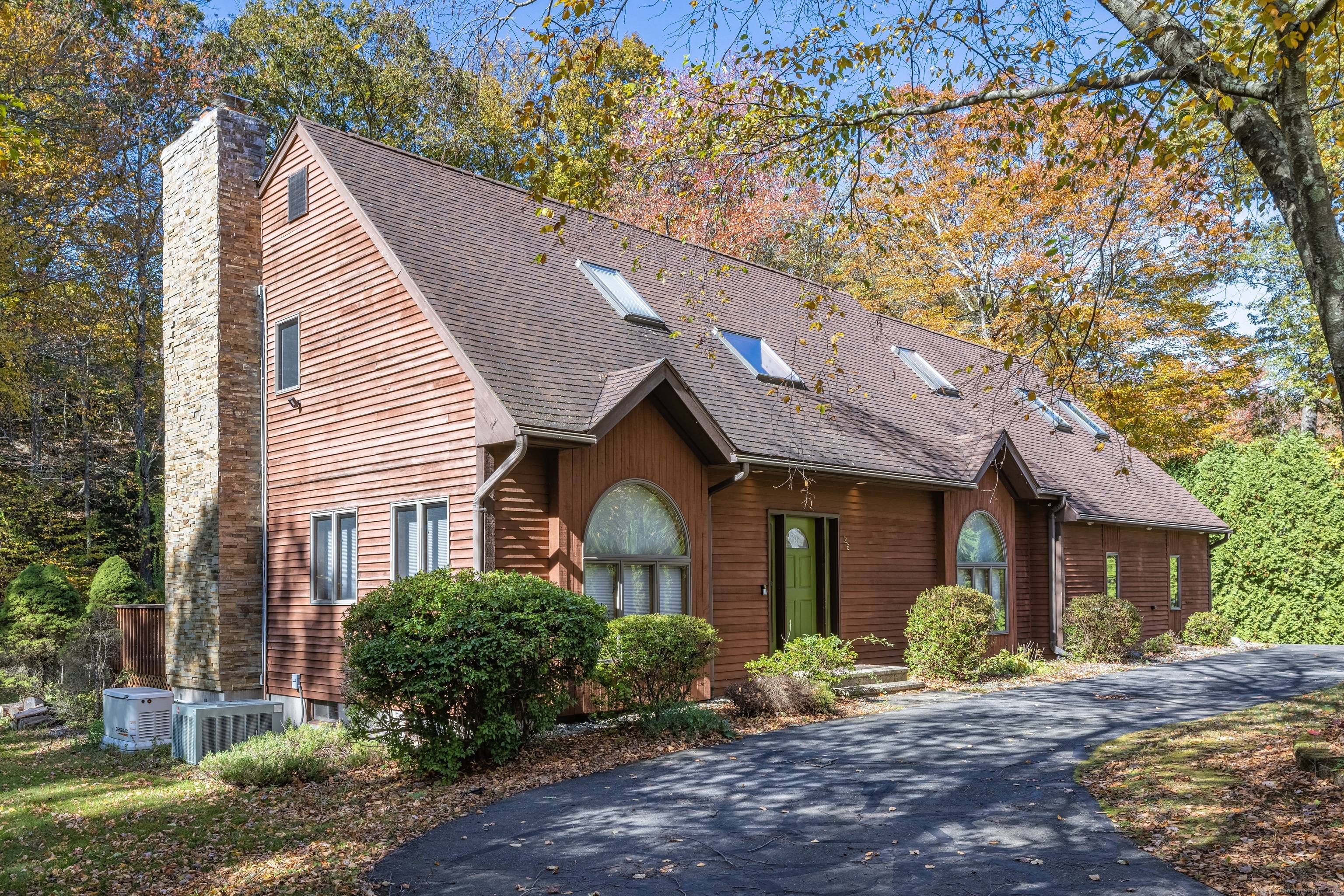 Private setting on Birch Mountain located on a quiet wooded cul de sac.