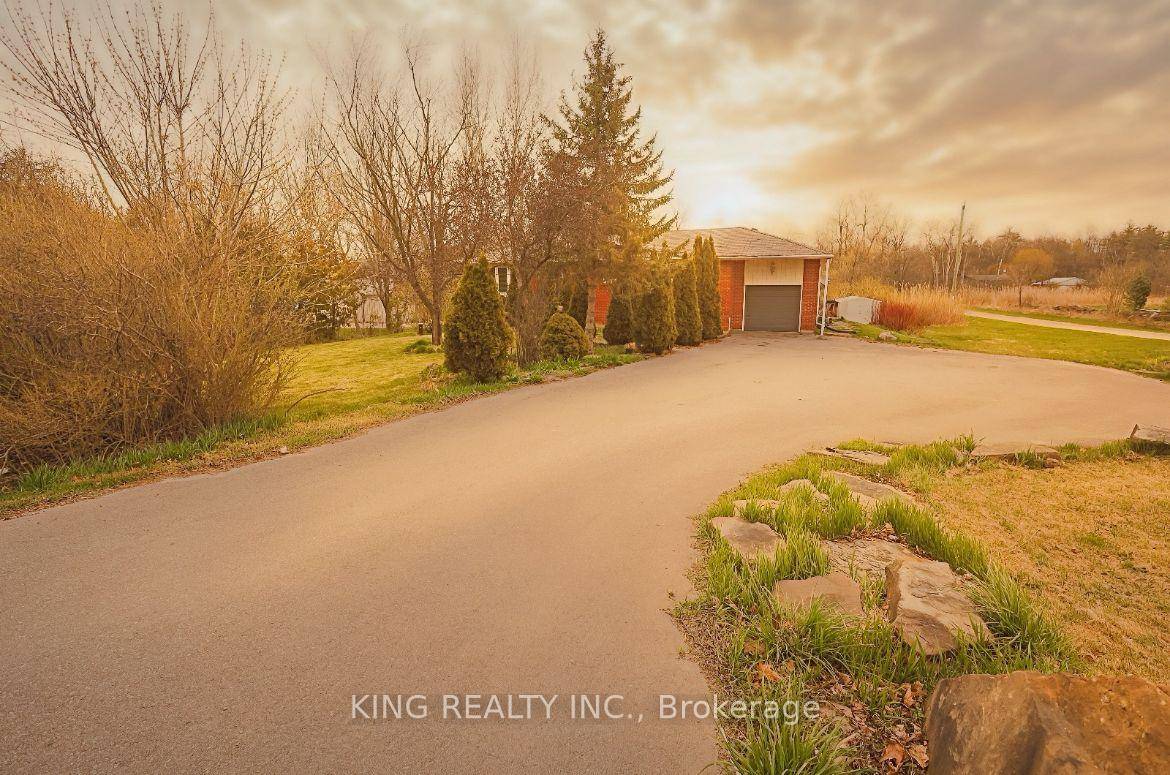 Beautiful Bungalow Nestled in the Scenic Landscape of Campbellville on a Spacious 0.