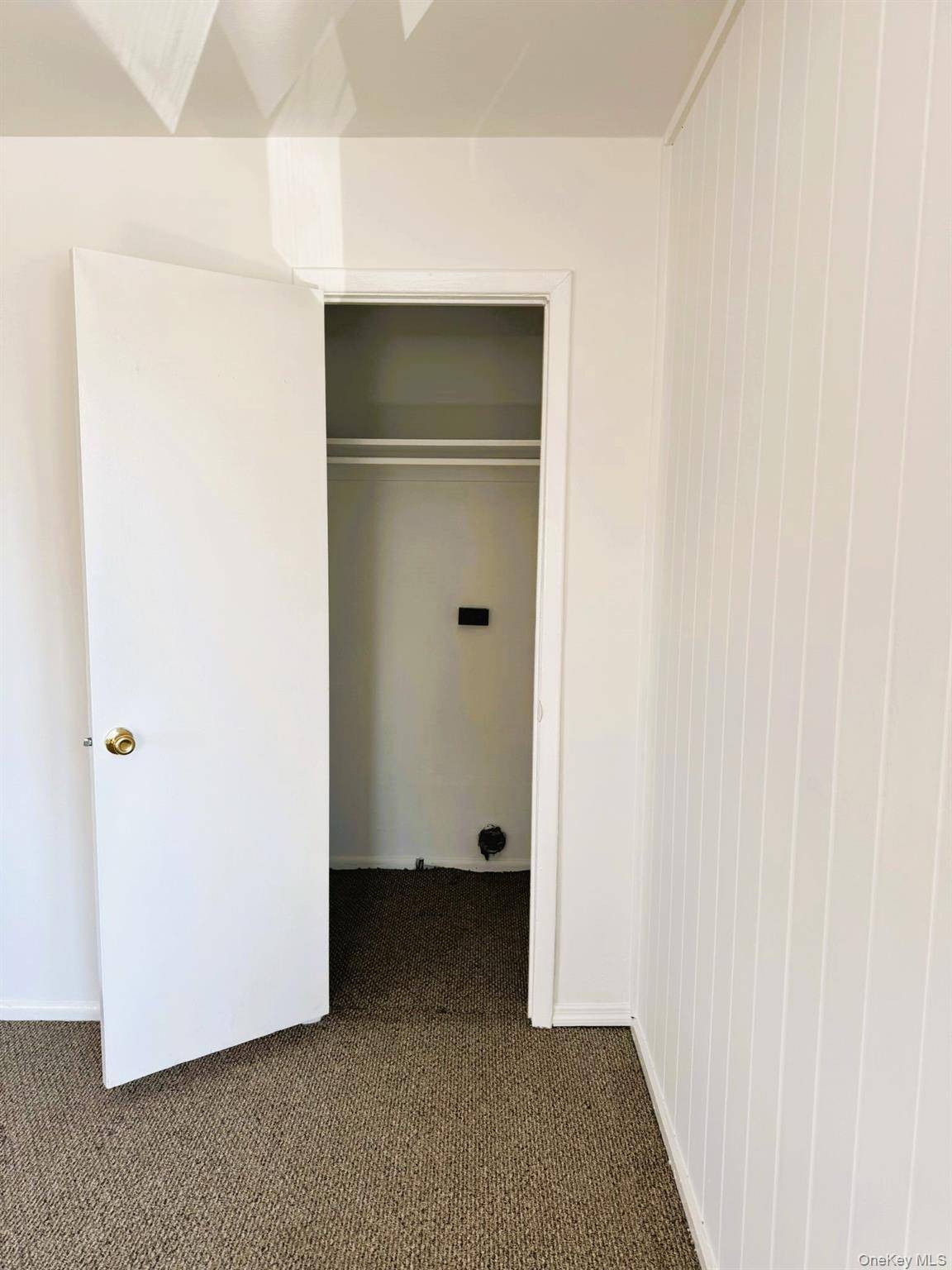 Spacious 3 bedroom, 1 bath second floor apartment in a well maintained two family home on Roslyn Road.