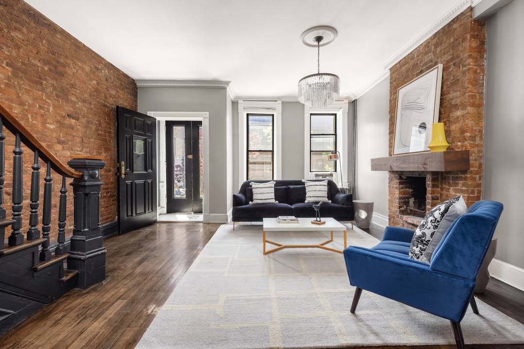 Timeless Sophistication on Garfield Place Discover the perfect harmony of historic character and modern refinement in this impeccably preserved two family brick townhouse.