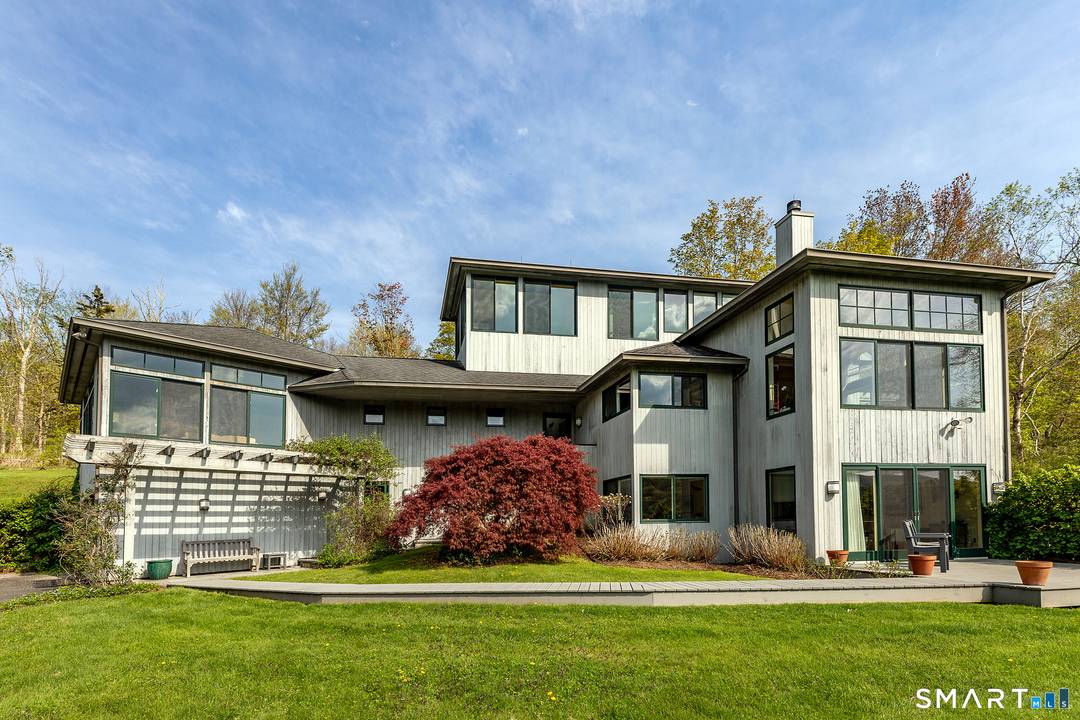 Experience the ultimate August retreat at 16 Anderson Acres Road, a contemporary masterpiece perched in the heart of Kent.