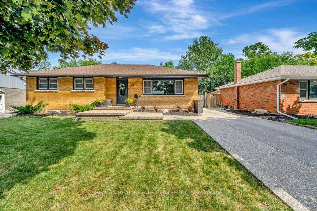 ONE OF A KIND BUNGALOW WITH DOUBLE CAR DETACHED GARAGE amp ; UPGRADES GALORE !