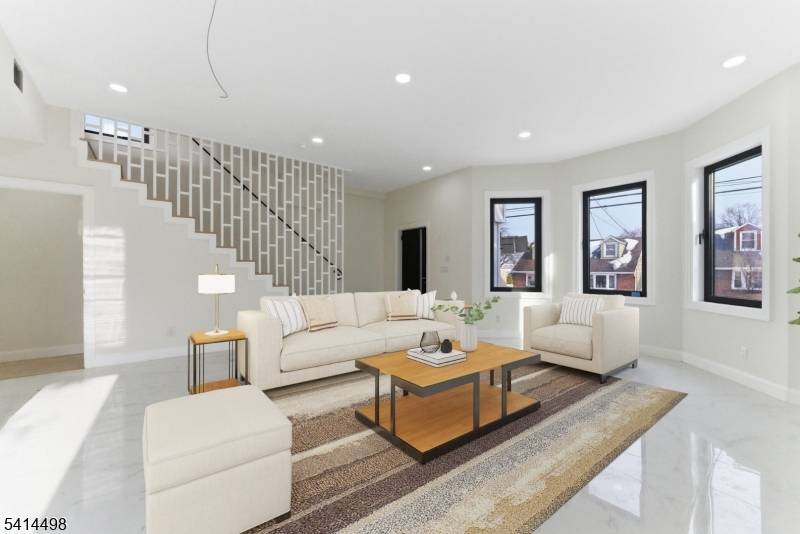 Fully Renovated 8 Bedroom and 5 Bathroom Home with In Law Suite Walk Out Basement Modern Finishes Throughout.