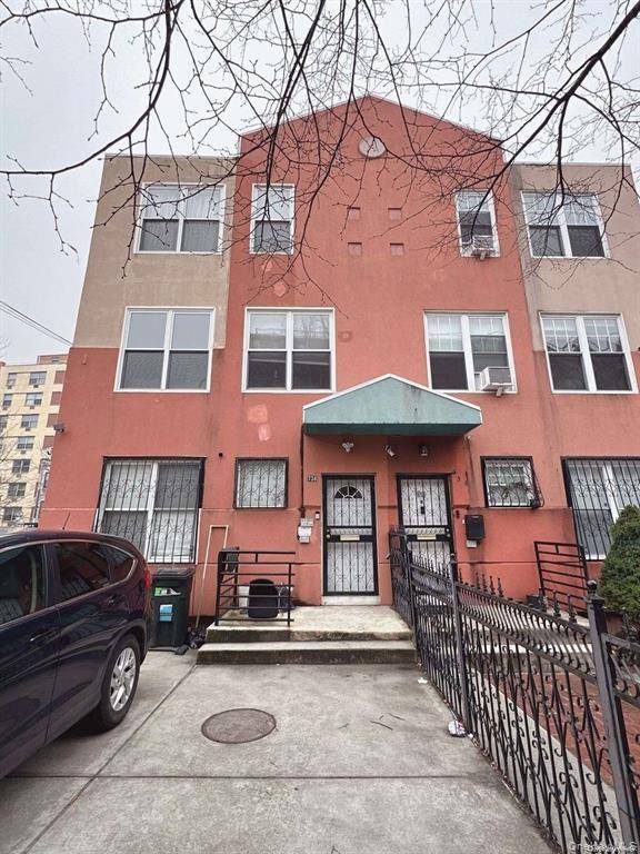 PRESENTING a Well maintained, recently fully gut renovated three story, two dwelling home conveniently located near public transportation and local amenities.