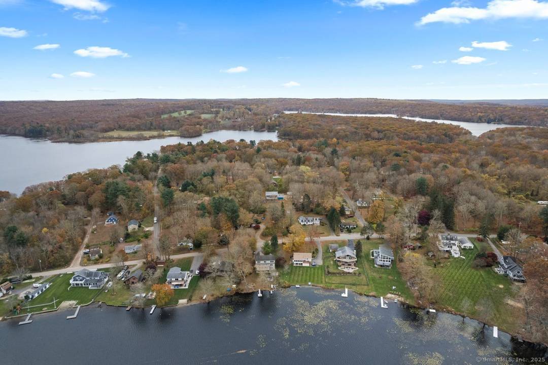 Welcome to this stunning, rarely available contemporary new construction at the end of a quiet cul de sac with partial views of Moodus Reservoir.
