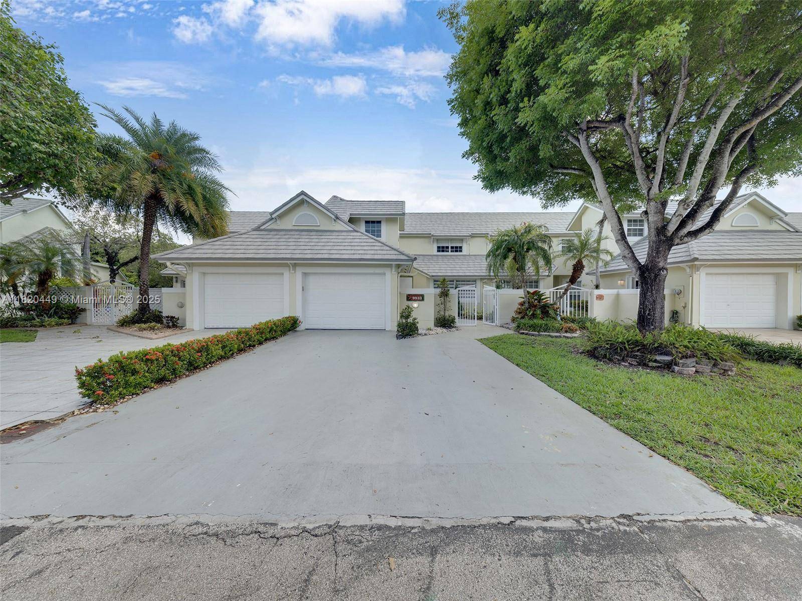 Welcome to this beautifully maintained 3 bedroom, 3 bath townhouse with a 1 car garage, located in the prestigious gated community of Doral Woods.