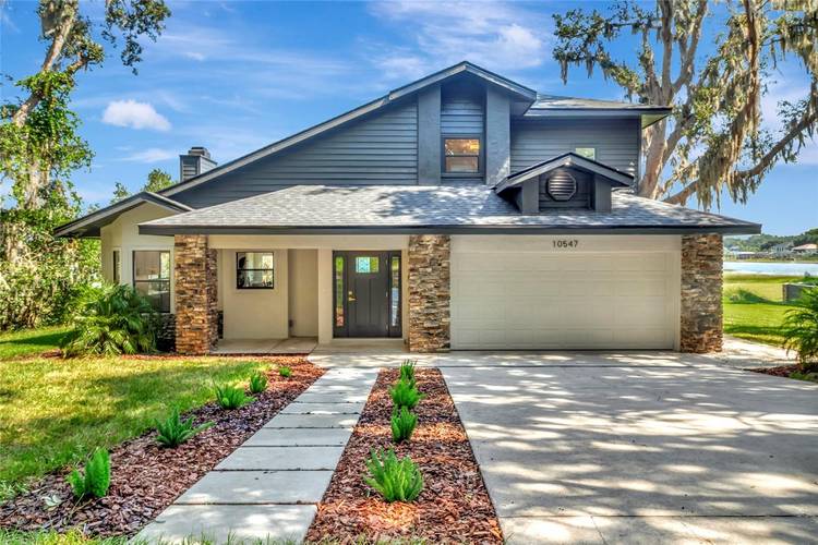 Welcome to an extraordinary waterfront retreat on the shores of Lake Crescent, part of the Clermont Chain of Lakes.