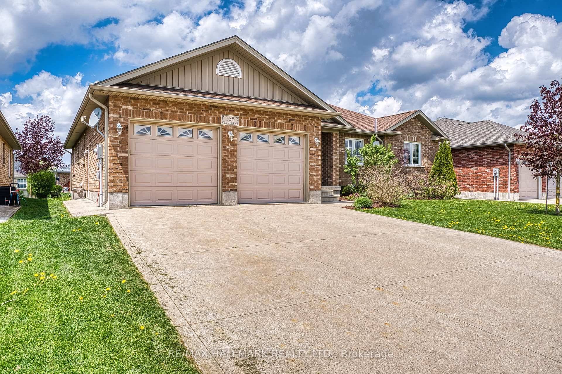 Spacious, bright, and move in ready, this Listowel bungalow offers an open concept kitchen, dining, and living area with a walkout to a covered porch and a generously sized backyard.