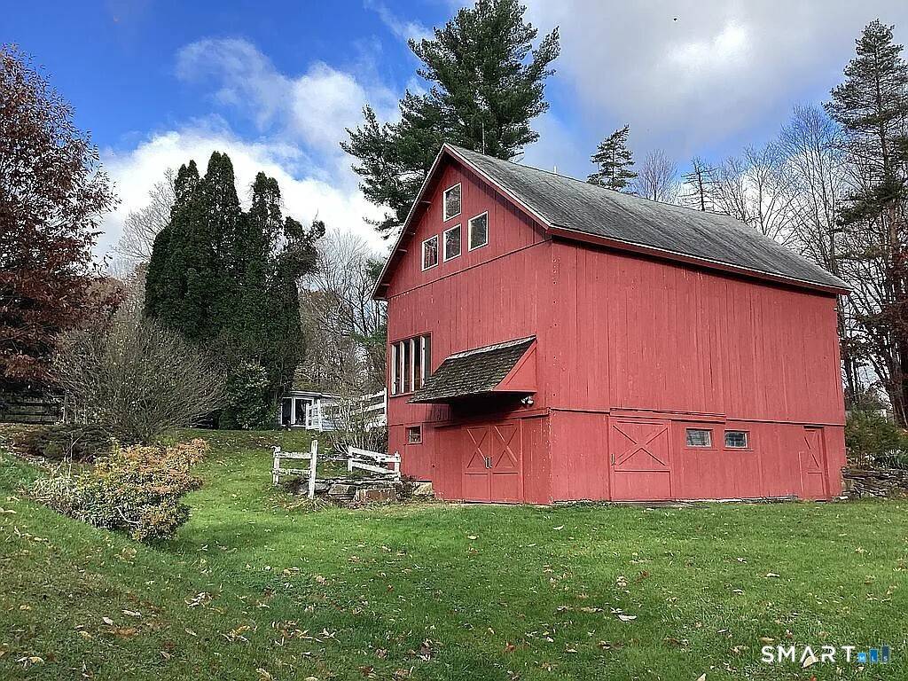 Cottage with post and beam Barn with loft on 15 acres.