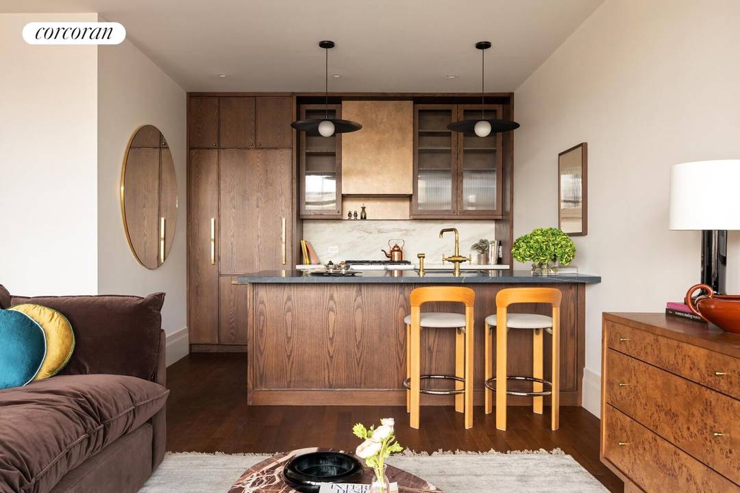 Enjoy an oversized 2 bed 2 bath with 11' ceilings, a very large balcony looking overlooking treetops, and a massive Great Room !