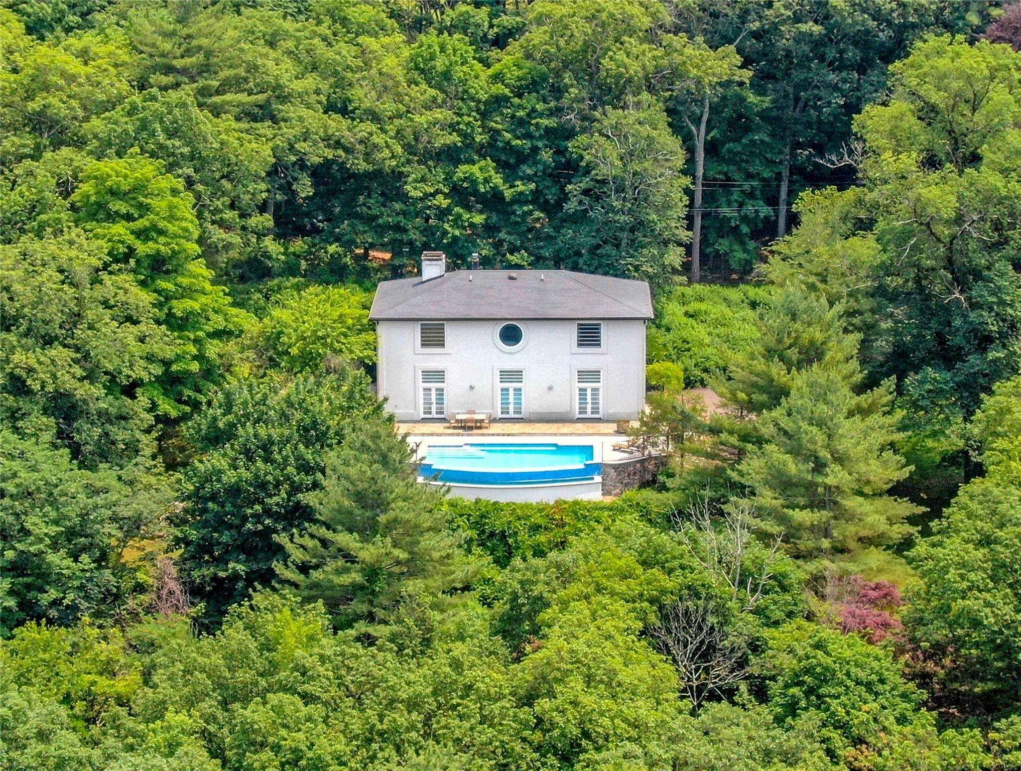 Welcome to sun infused Hill House, created in 1988 by designer Geoffrey Bradfield for himself.