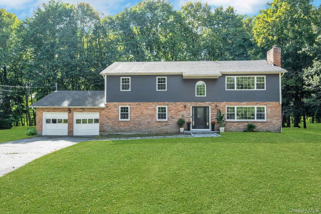 Tucked away on a quiet cul de sac in the picturesque town of Katonah, this beautifully updated five bedroom, four bath home sits on over an acre and offers more ...