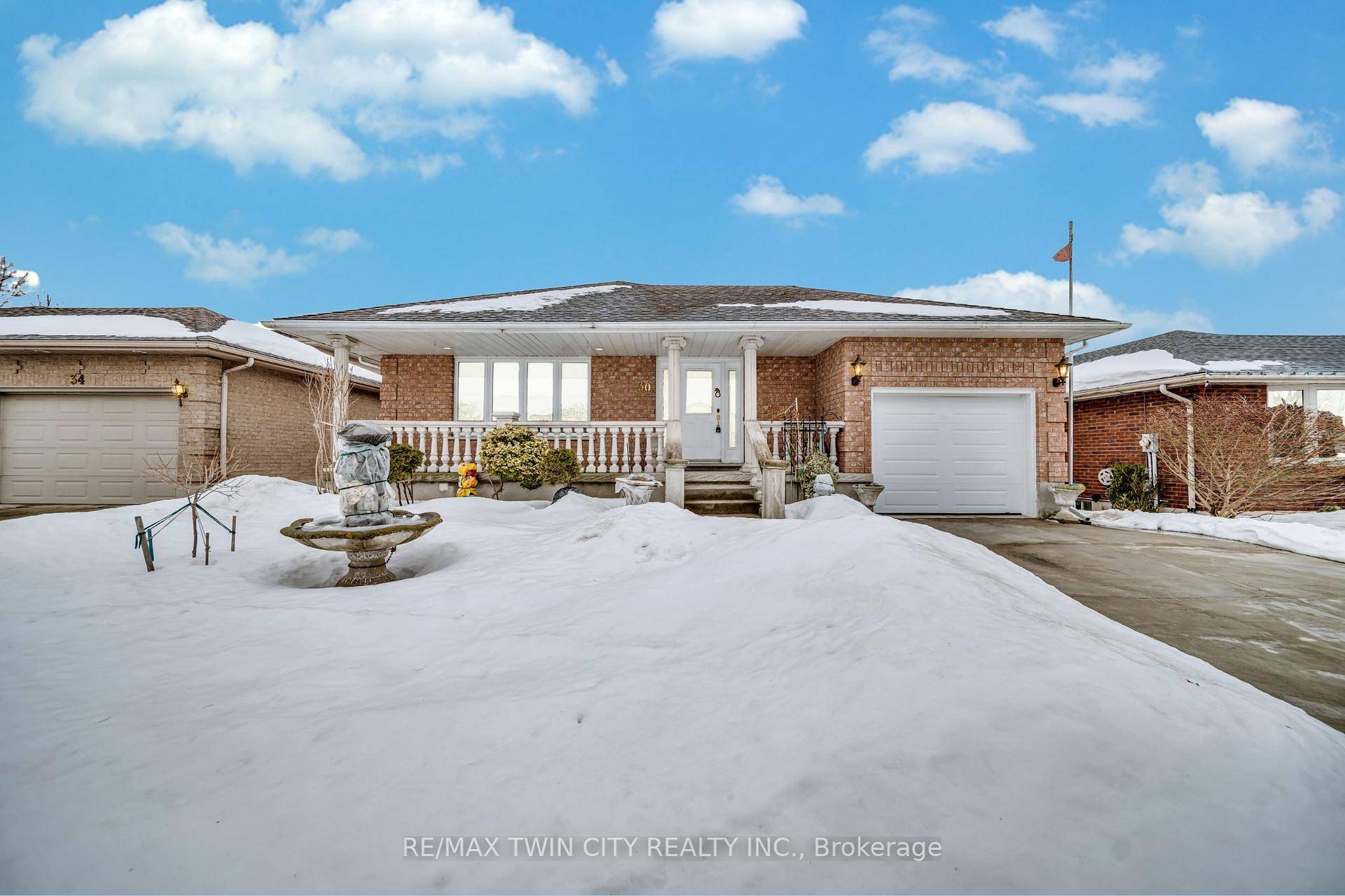 Welcome to 30 Knowles Dr, a charming bungalow nestled in sought after neighborhood of Woodstock.