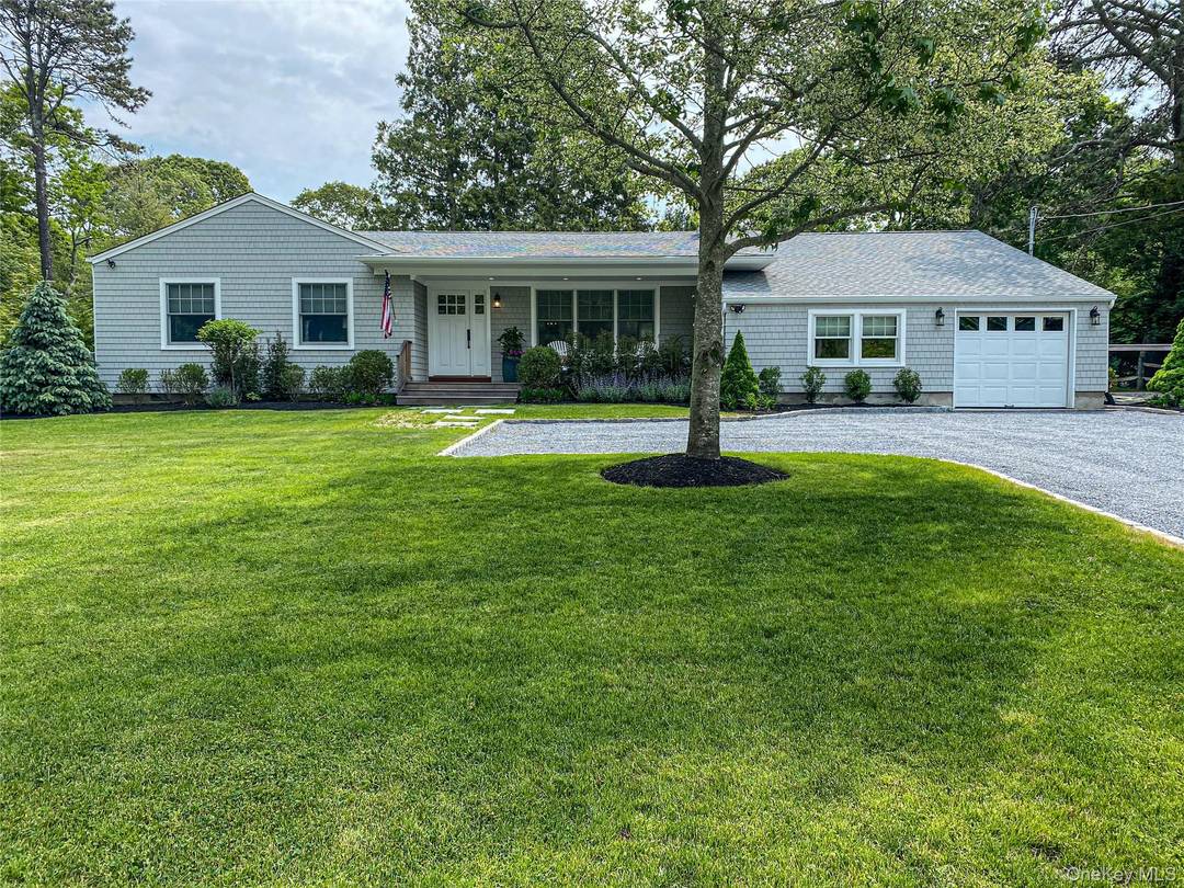 Renovated, immaculate ranch in the Village of Westhampton Beach with open living room, dining area and kitchen.