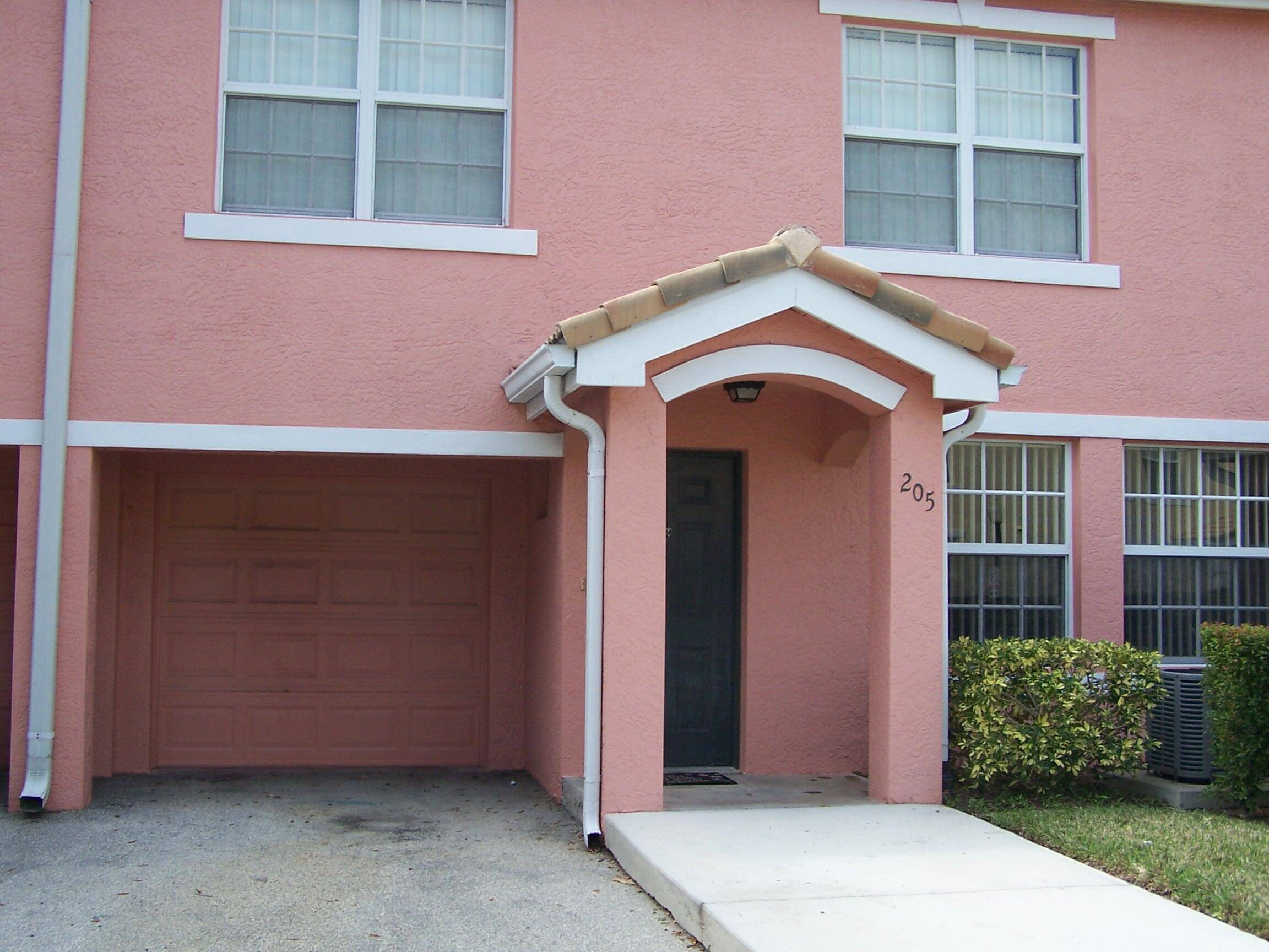Welcome To The Belmont ! This 2 bedroom 2 bath with 1 car garage is freshly painted with a new refrigerator and air conditioning unit only one year new.