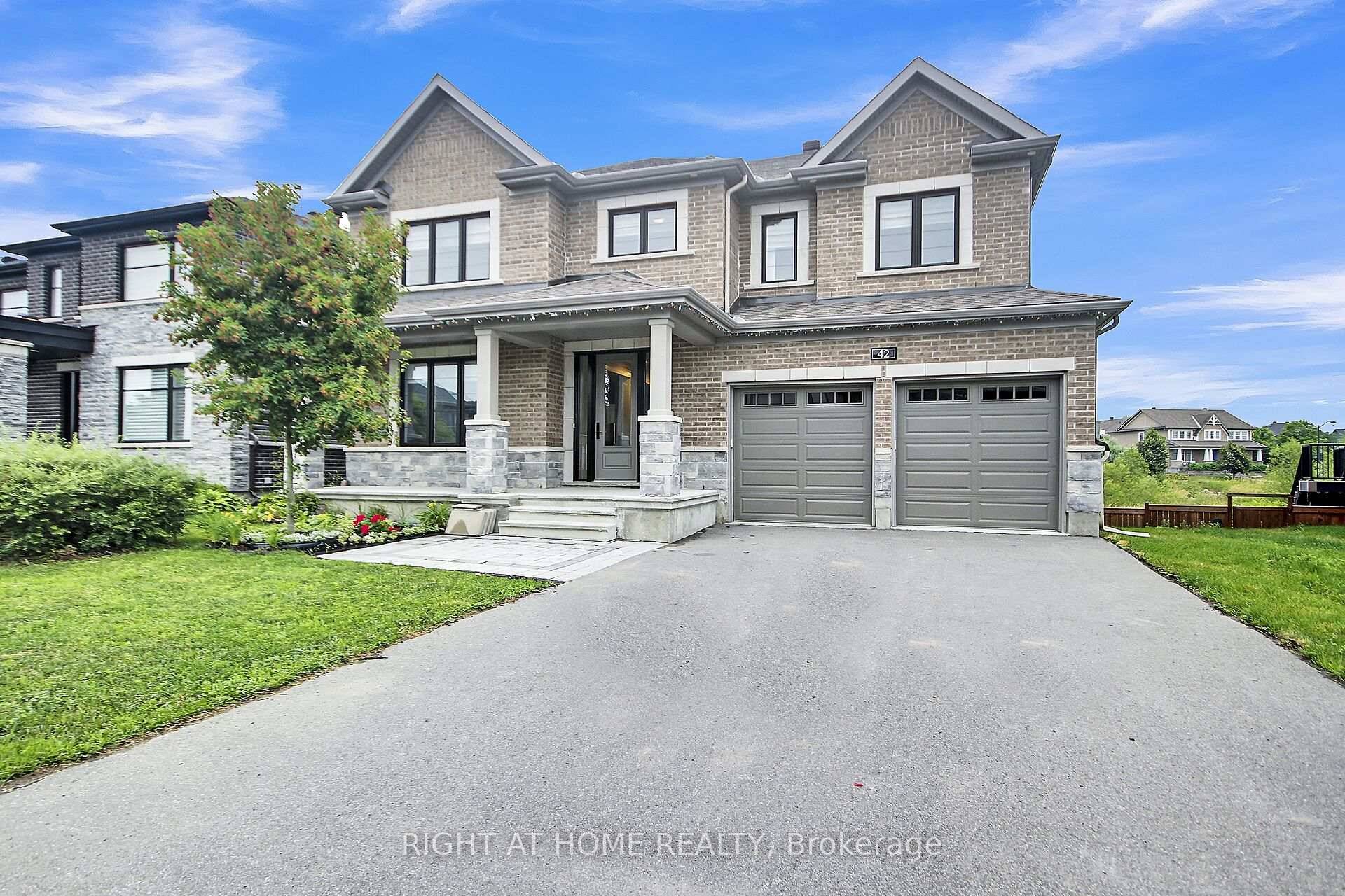 Welcome to this exceptional creek backed multi generational home in the highly sought after Mahogany community !