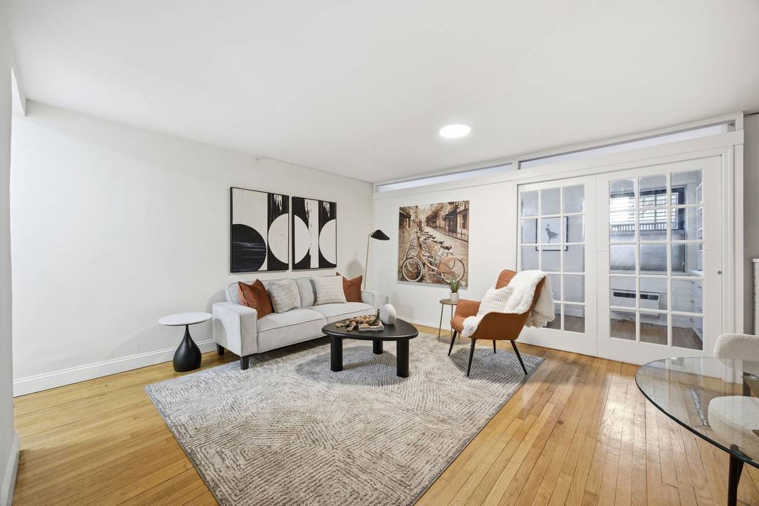 Nestled on a charming tree lined block in the heart of Gramercy, this oversized junior one bedroom offers warmth, character, and functionality within an intimate pre war cooperative.