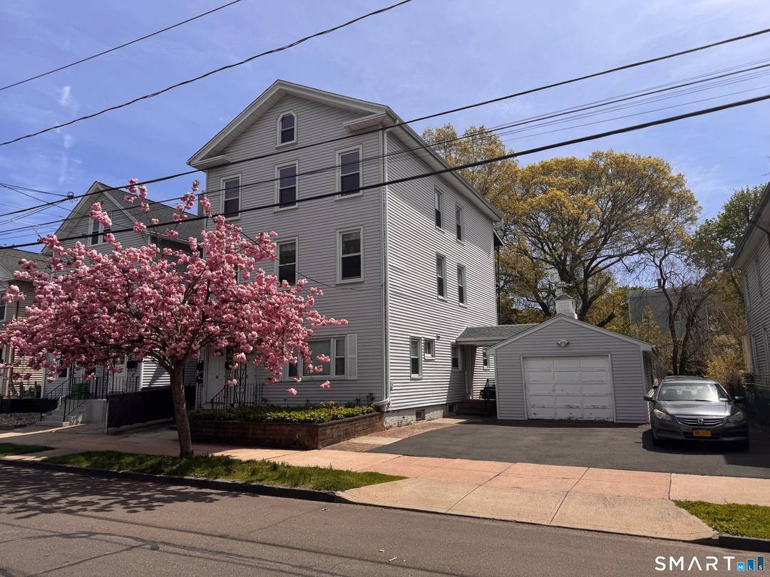 Wonderful three family home with excellent income in East Rock.