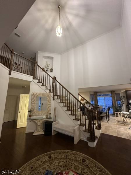 The prestigious Bel Air community offers this Delano model end unit for luxury living.