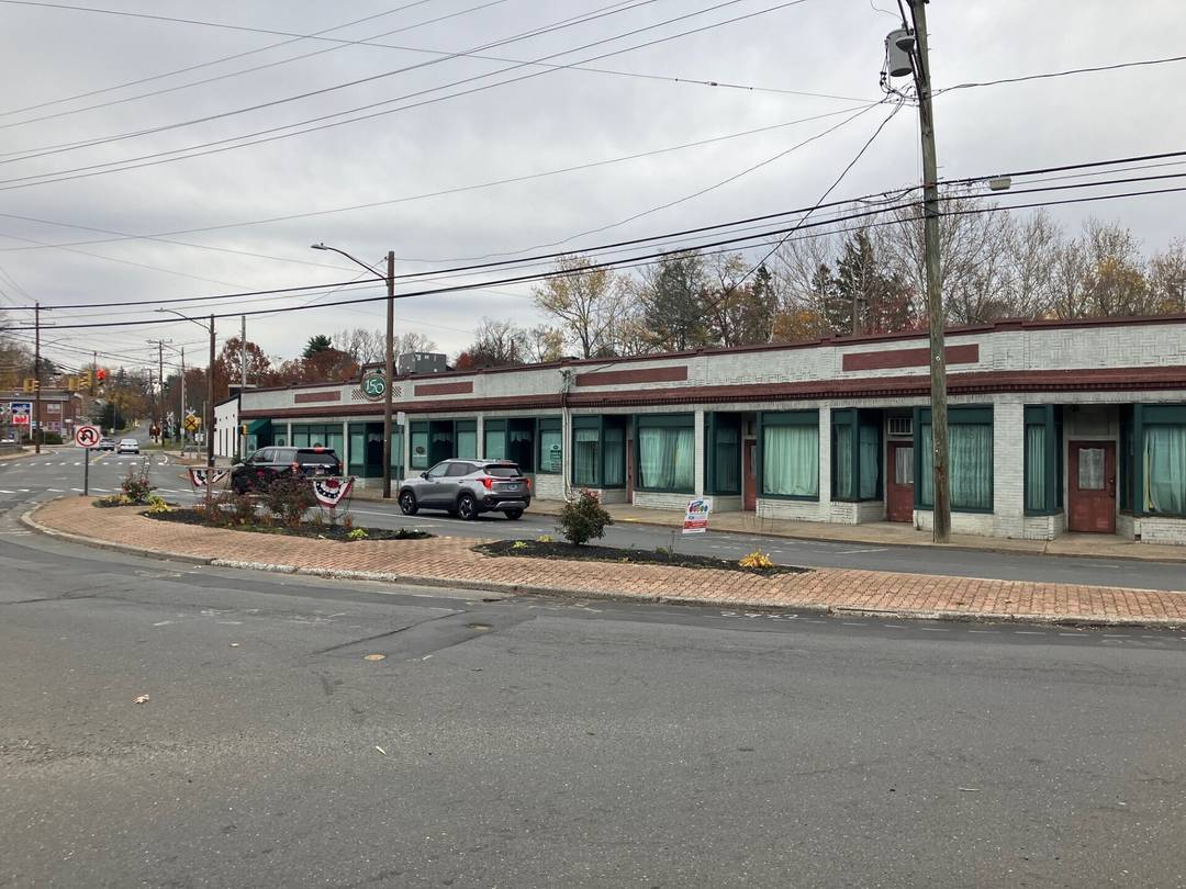 Opportunity meets location with this versatile commercial property situated on just under one acre of land, featuring approximately 273 feet of road frontage.