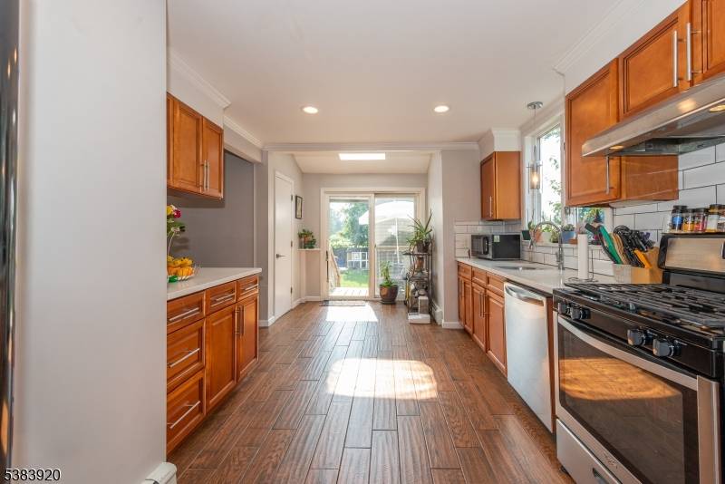 Welcome to 134 Dewey Avenue, a modern haven nestled on a quiet street in Totowa, NJ.