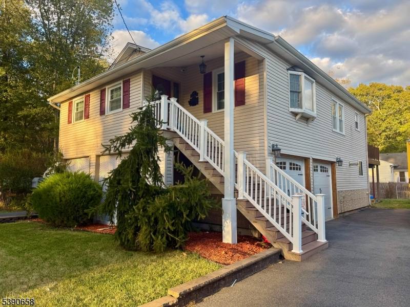 WELCOME HOME to your dream retreat on a quiet, dead end street in desirable Pequannock !
