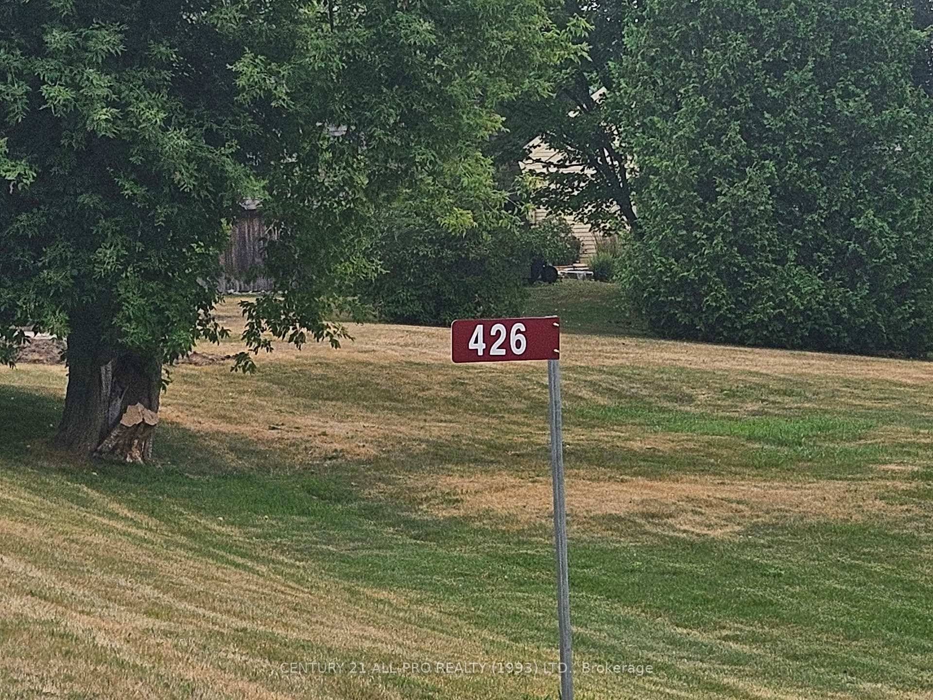 Newly severed 5. 1 acre building lot with driveway entrance installed.