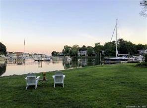 Classic historic colonial seated at the head of Five Mile River with a 40' long deep water dock and a second tidal dock for all of your boating needs !