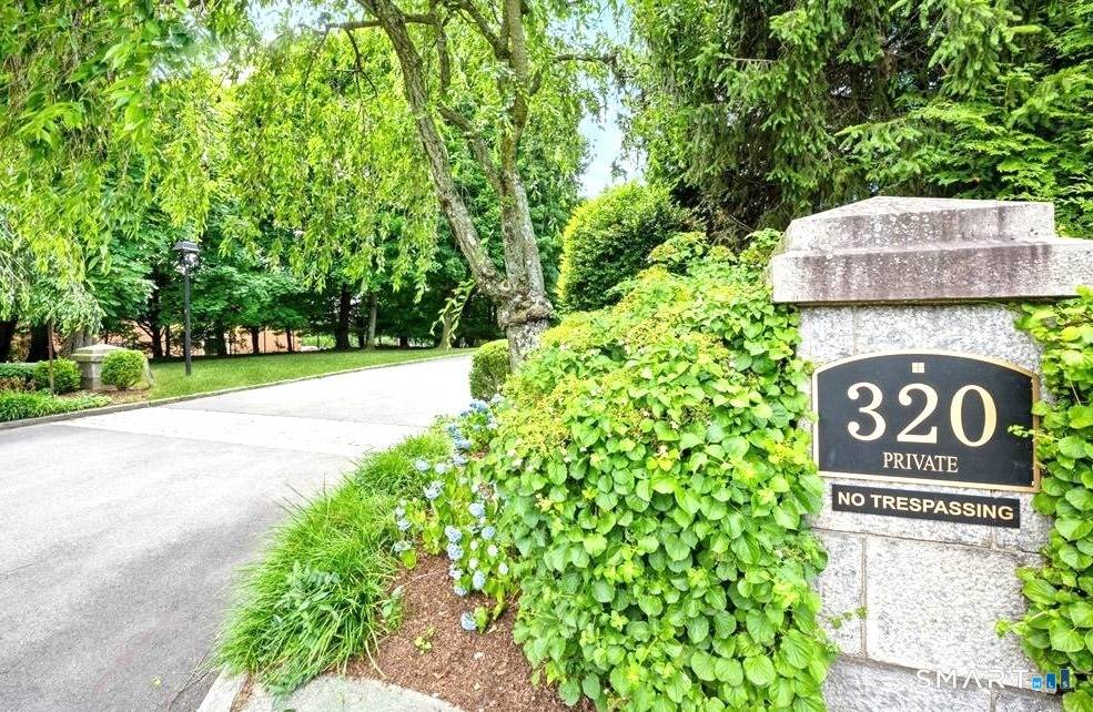 End Unit and quiet location in a Stamford's best private and sought after community living !