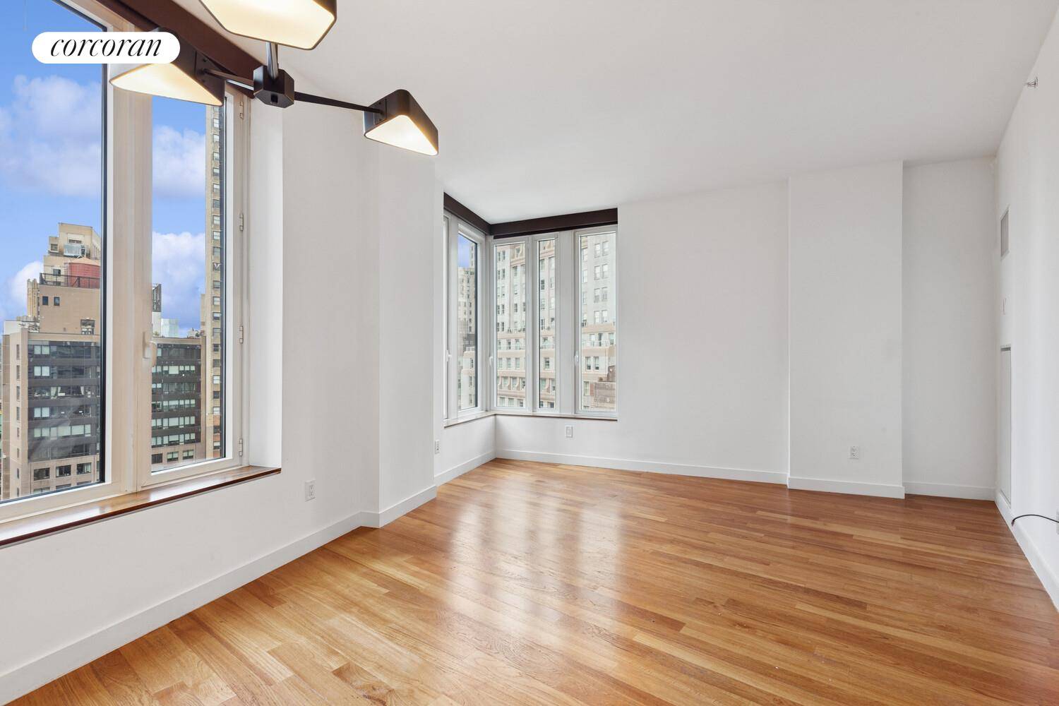 Welcome to Residence 33I at 15 William Street a luminous and elegantly designed 2 bedroom, 2 bathroom home soaring above the Financial District.