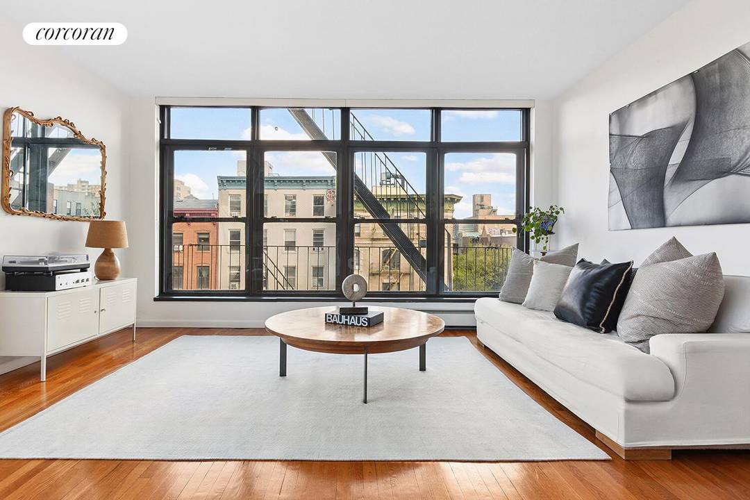 Loft in the Sky with Downtown Views 133 Second Avenue, Apt 11 Stunning top floor, this sun drenched loft like two bedroom, one bath residence offers sweeping open skyline views ...