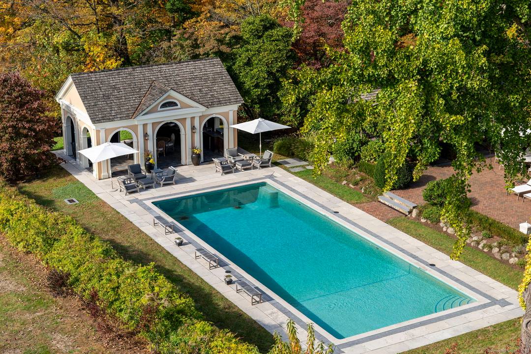 Tucked away on over 4. 5 private acres off Historic Mountain Spring Road this Georgian inspired estate is an extraordinary example of American architectural heritage.