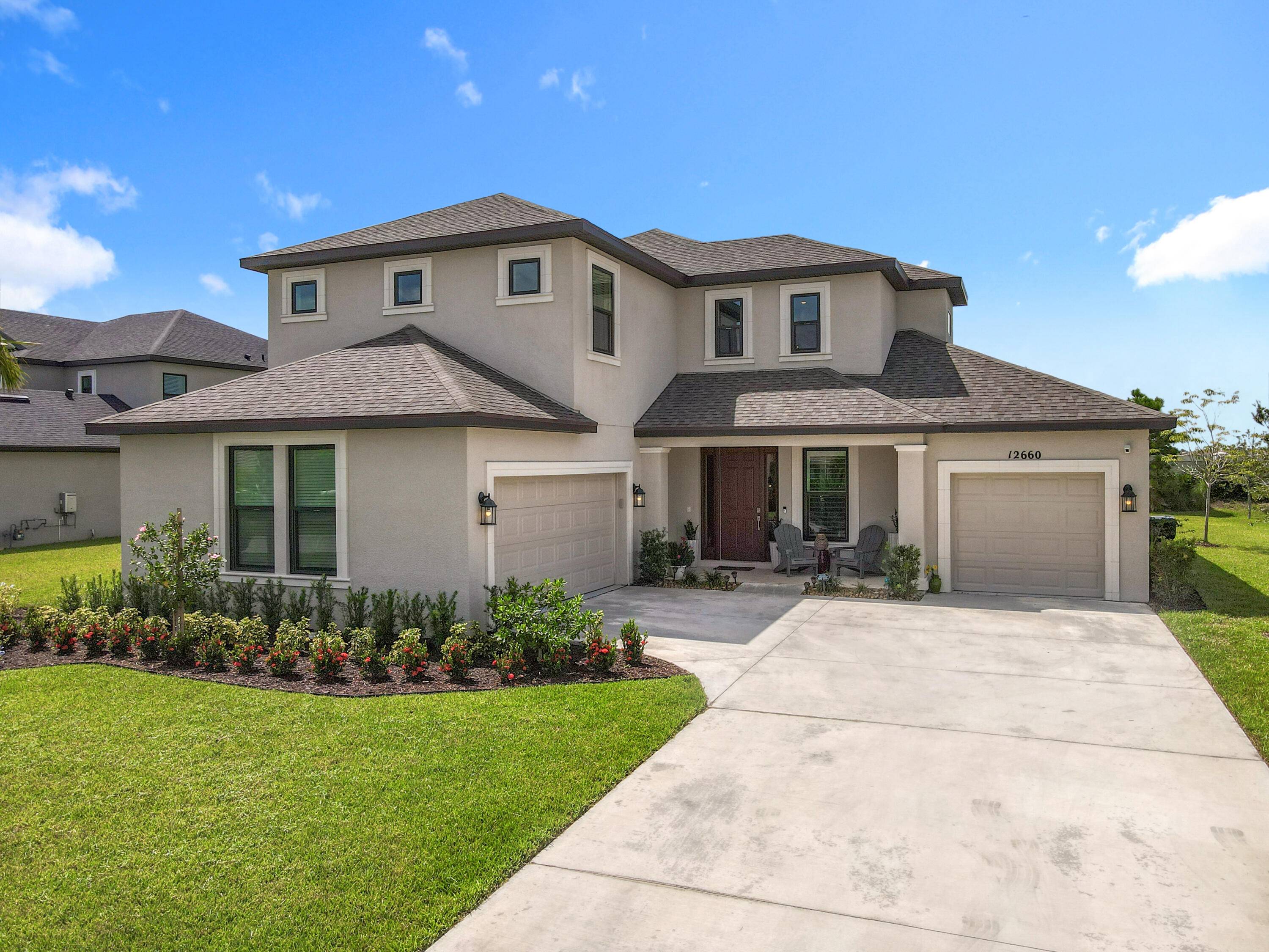 SPECTACULAR ! 5 Bedroom 4 and a half bath 2 story home with 3 car garage, located in the heart or Tradition !