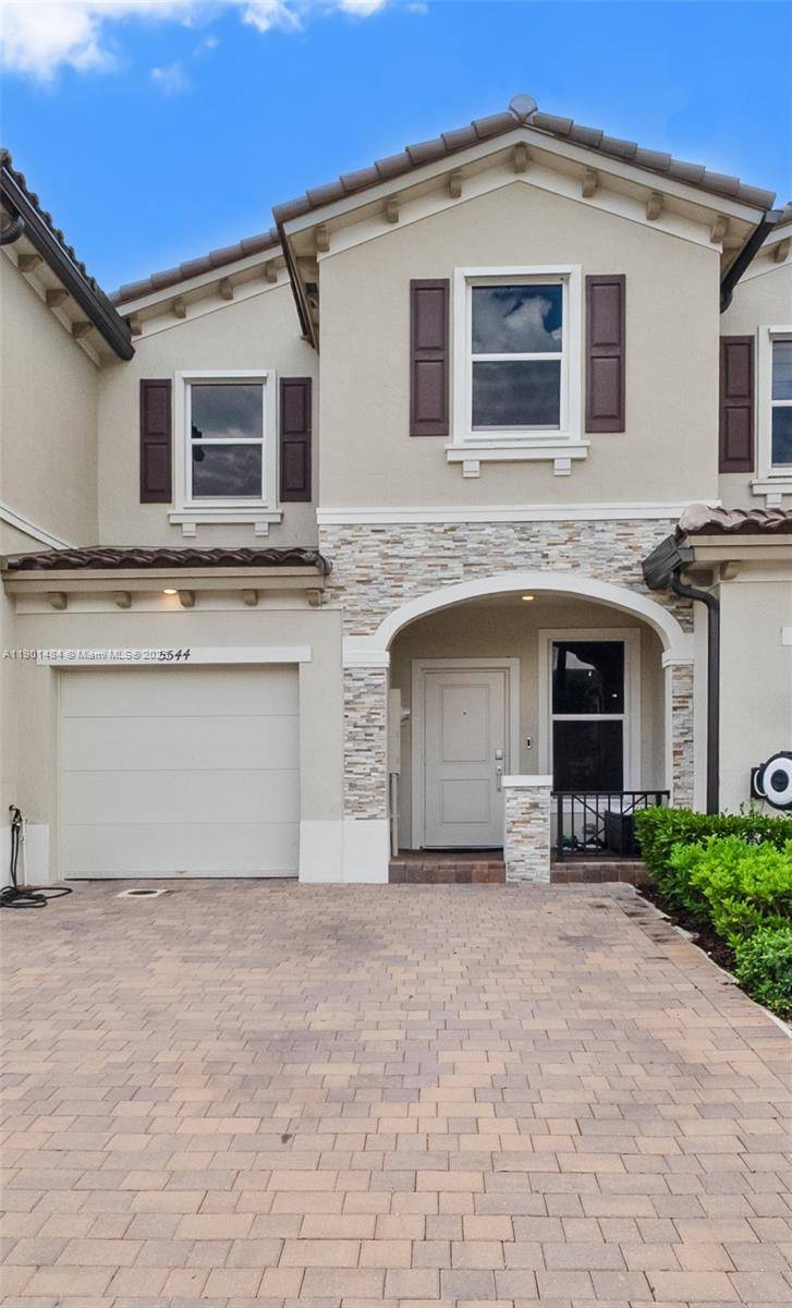 Stunning Townhome 2023 year built in a Gated Boutique new community.