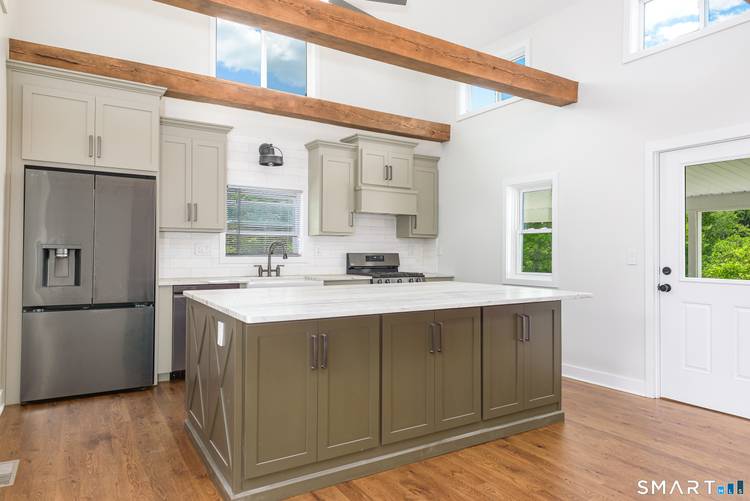 Experience the charm of this beautifully restored historic home, where timeless character meets modern comfort.