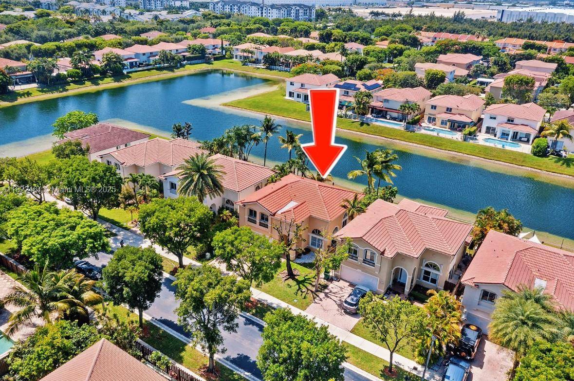 Doral Meadows by the Lake Stunning 2 story lakefront home in one of Doral s most sought after gated communities with 24 7 security.