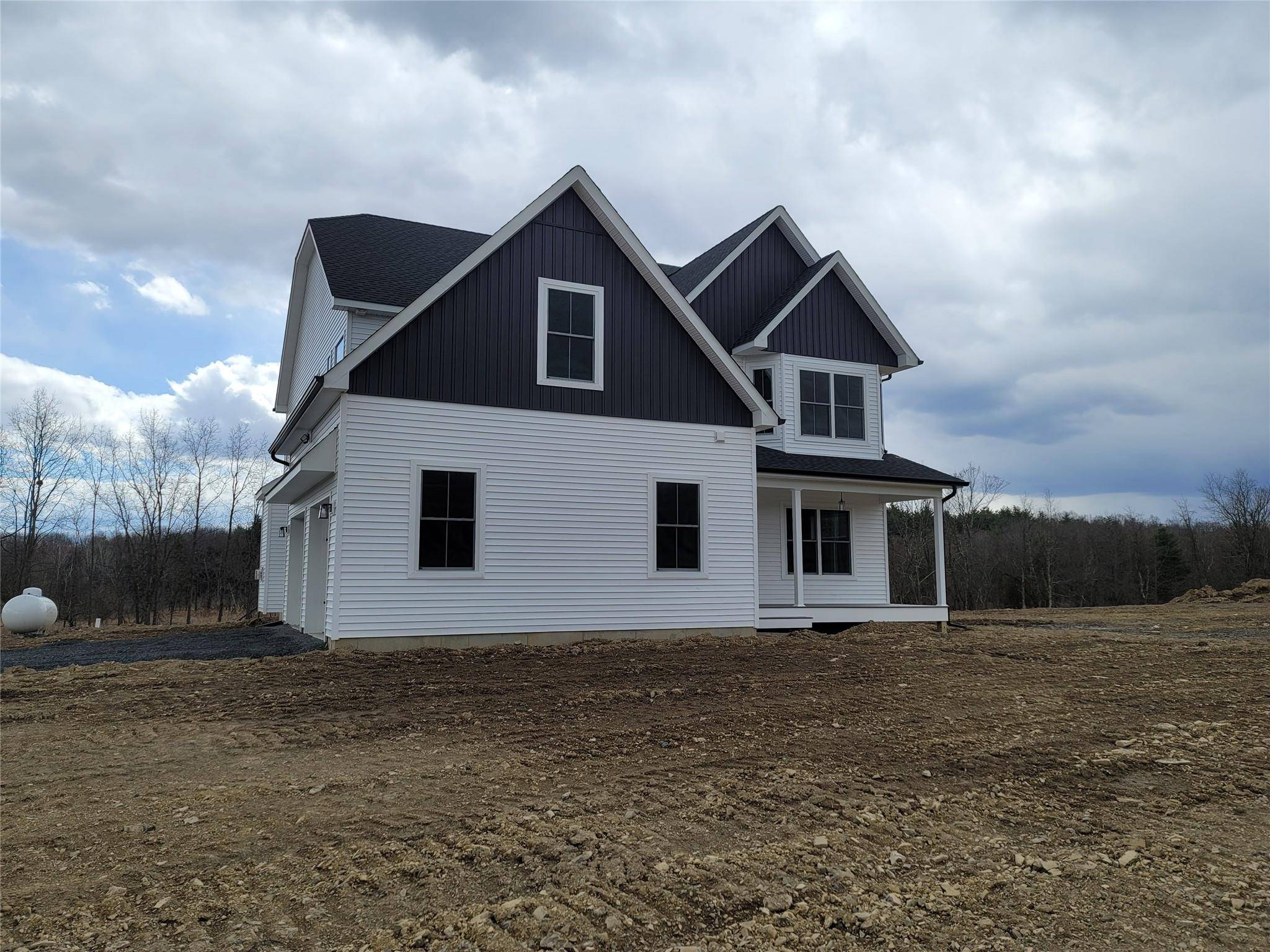 New construction colonial being built in Round Hill Estate, a picturesque 6 lot subdivision nestled in the charming town of Warwick.