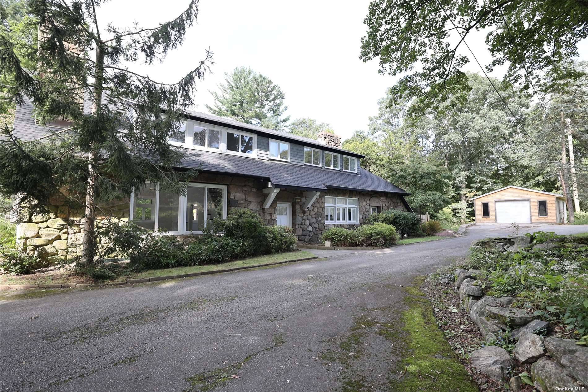 Tucked away up the hill is a warm, inviting and charming Carriage house.