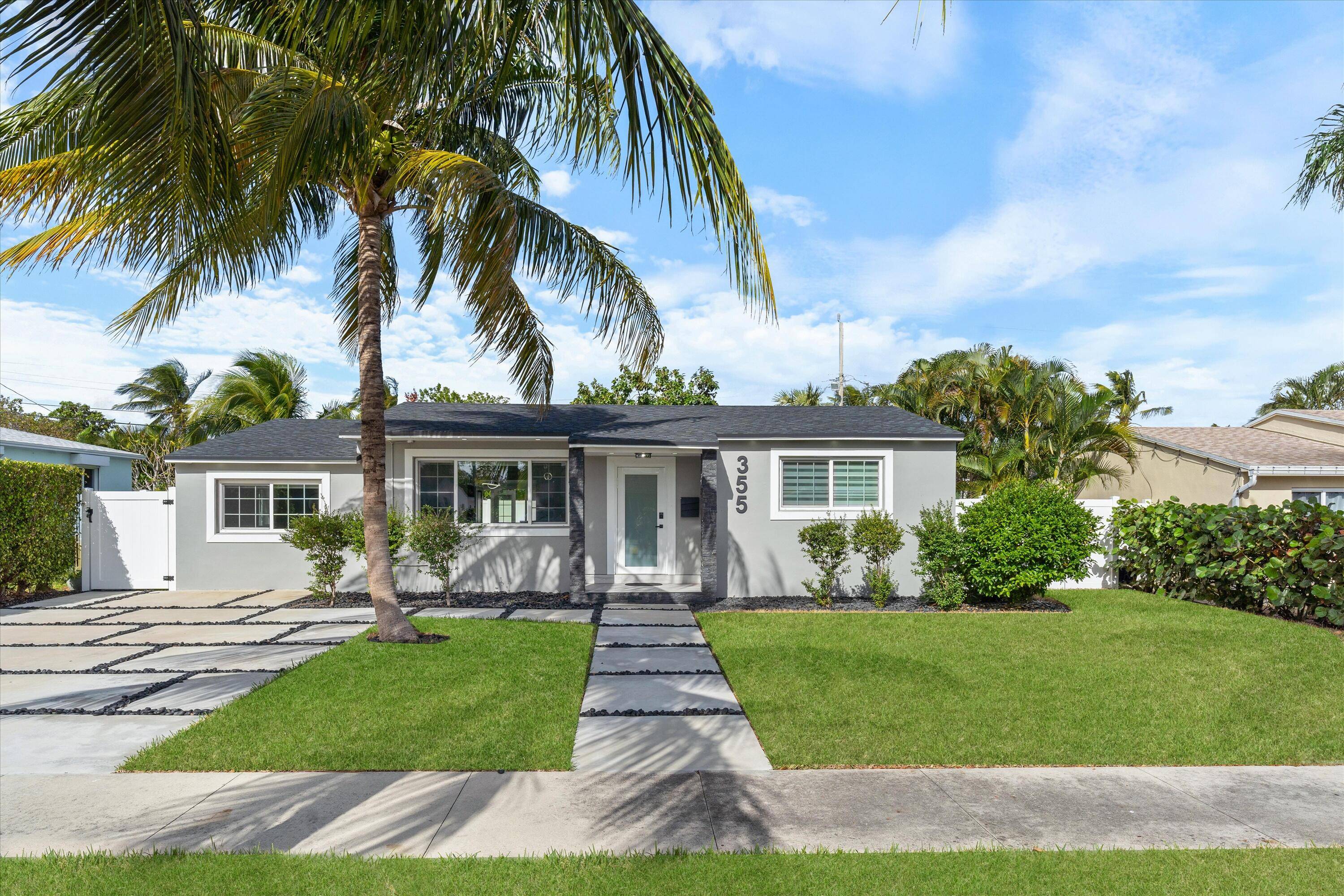 Experience a newly remodeled Modern, West Palm Beach home is just 2 blocks from the Intracoastal.