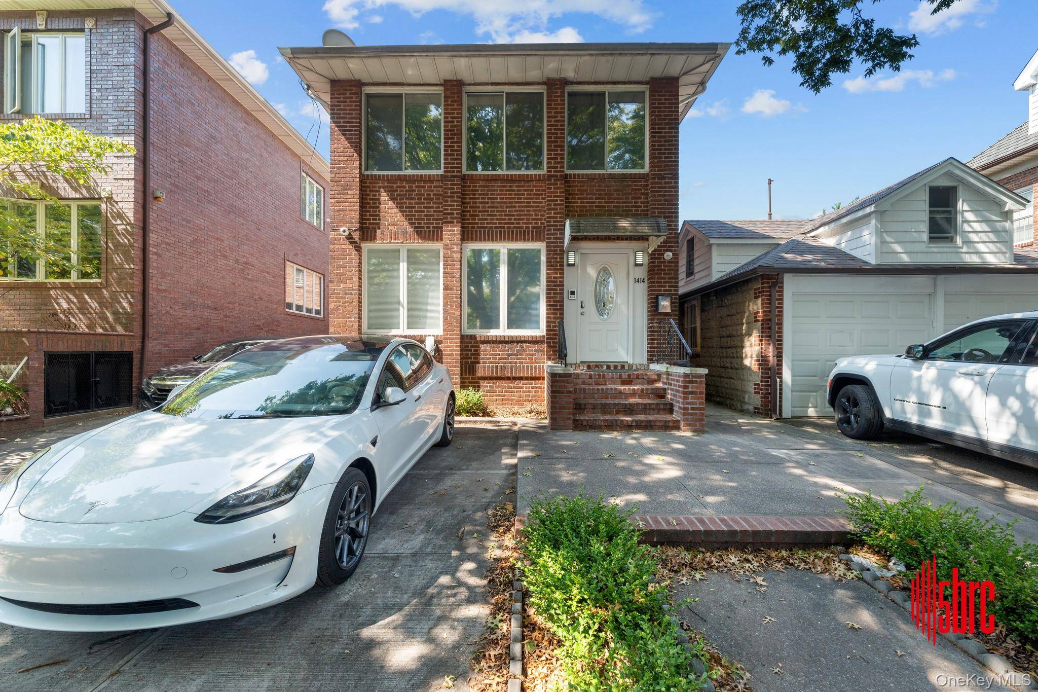 1414 East 28th Street is a masterfully renovated two family residence that blends modern sophistication with exceptional functionality.