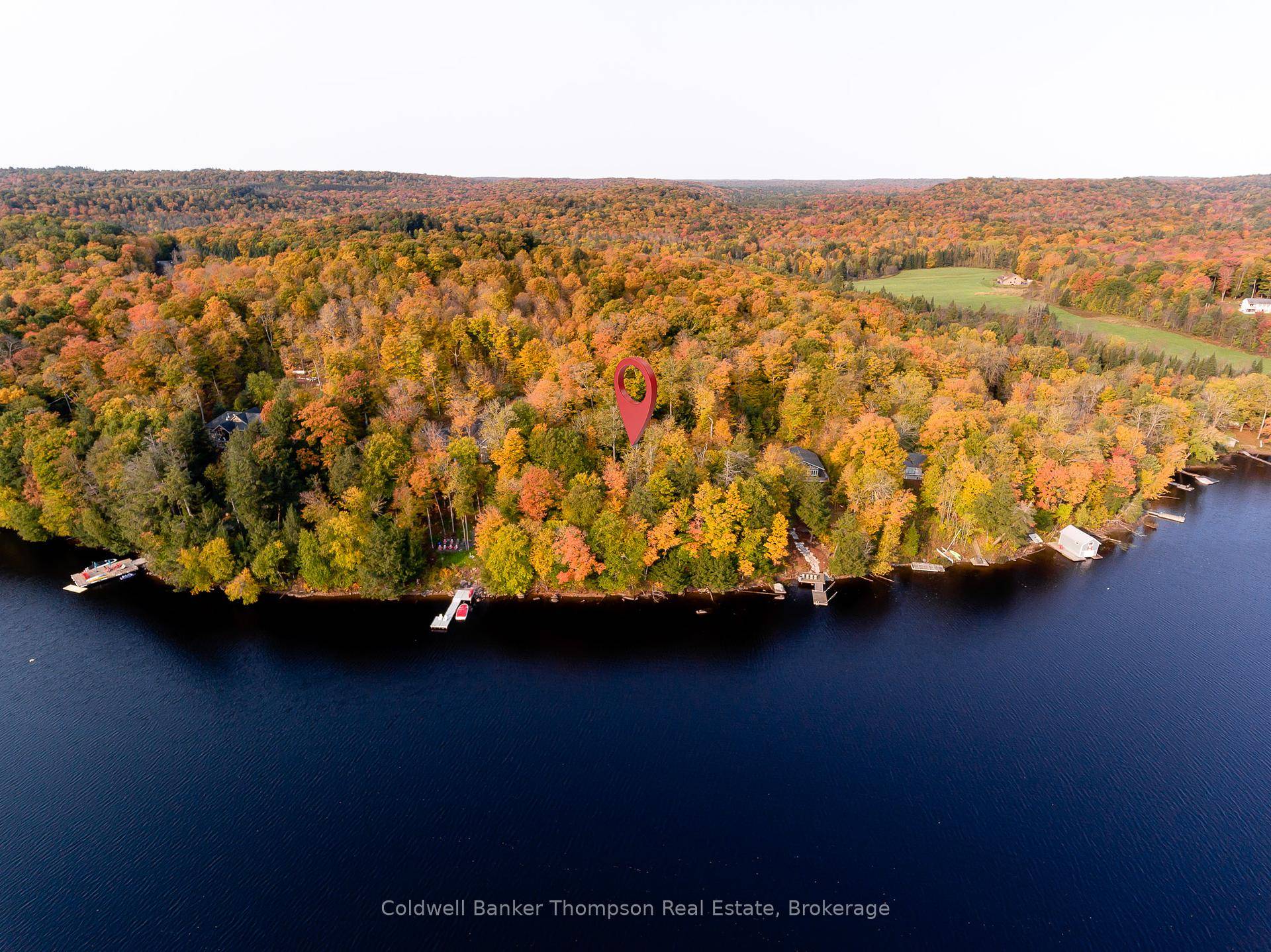 Rare offering of this 2 acre waterfront lot with 200 feet of frontage in a quiet bay on sought after Lake Vernon.