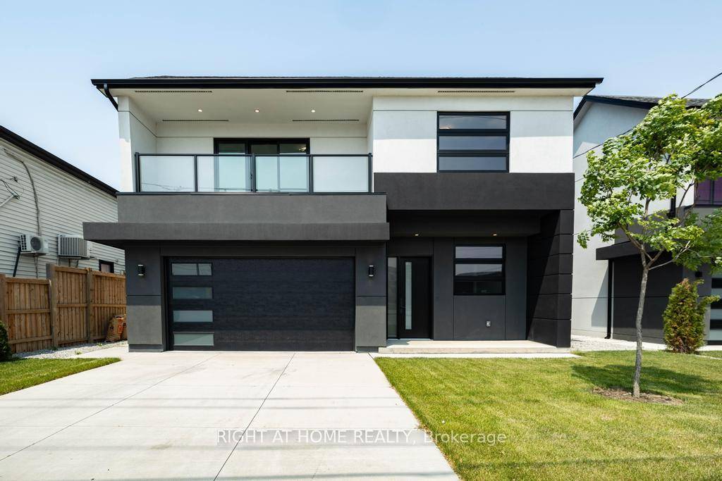 Welcome to this Custom Built, Sun Soaked, Modern Design Masterpiece !
