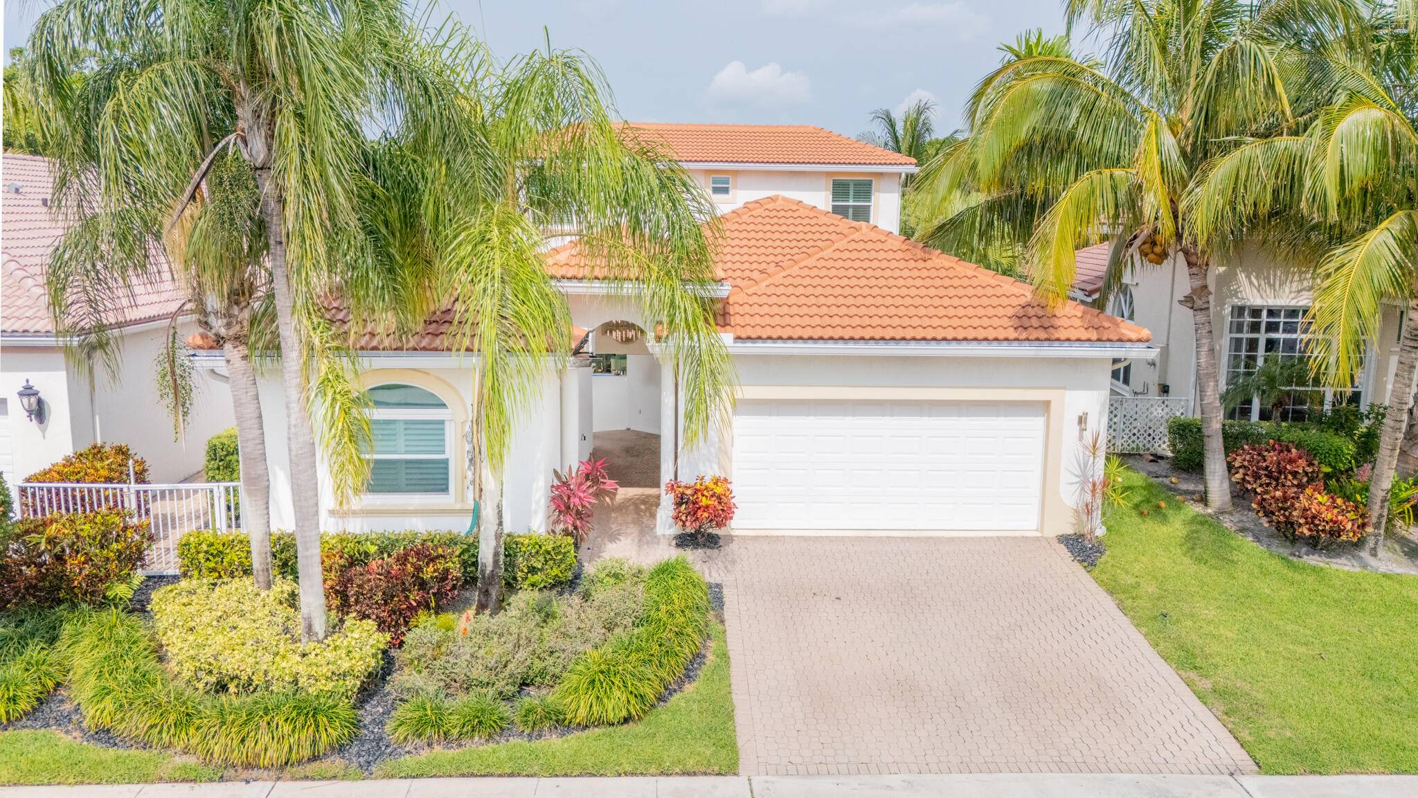 Move right into this beautifully renovated 4 bedroom courtyard style pool home located in the exclusive gated community of Boca Preserve a true hidden gem in prime East Boca.