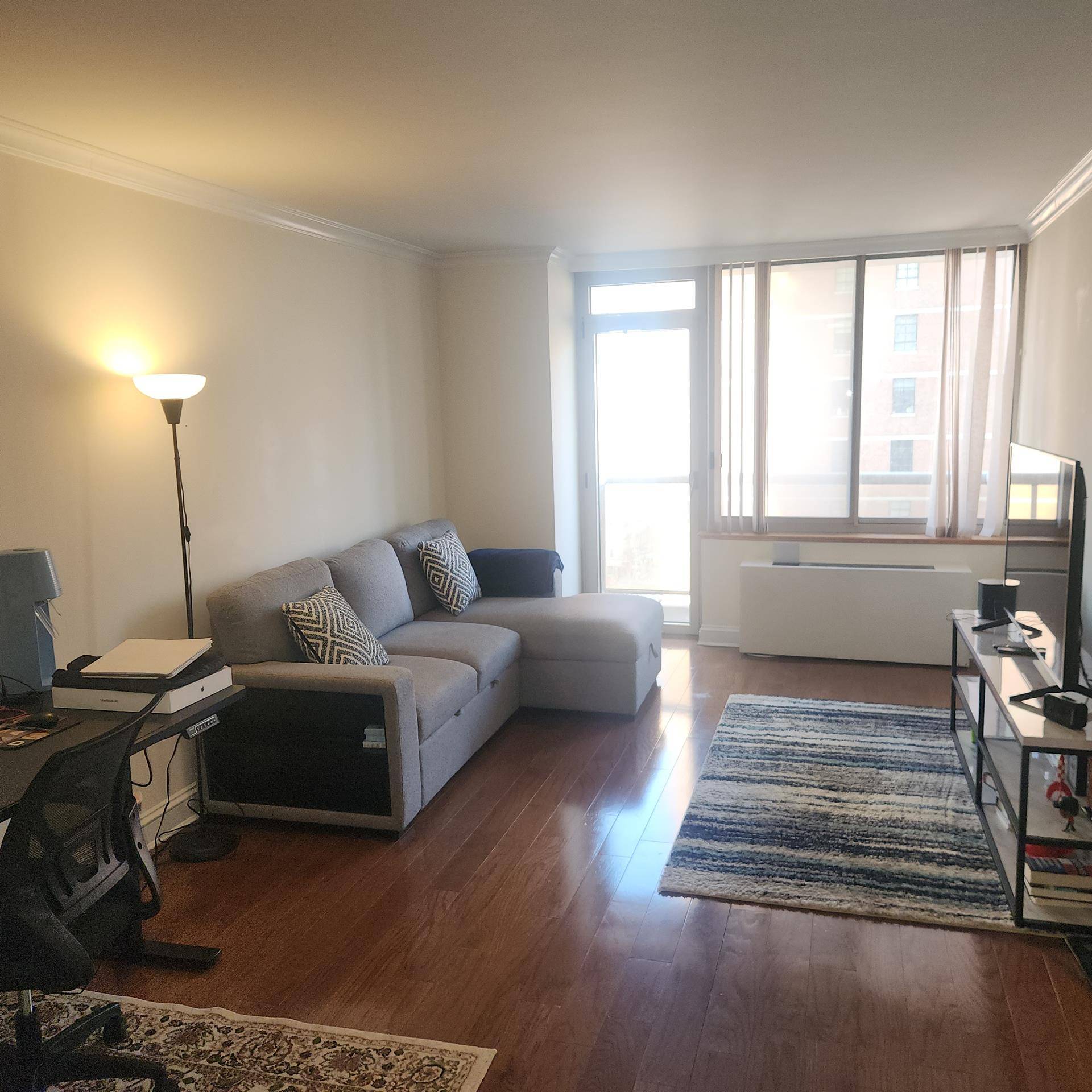This Renovated 1 Bedroom with a private balcony, Includes a New Kitchen With Granite Counters and Stainless Appliances, New Wood Floors Throughout, Beautiful Crown Moldings, Designer Doors and Hardware, and ...