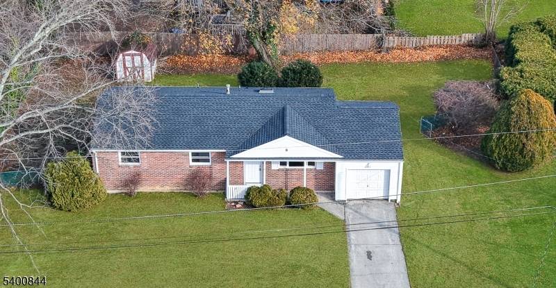 Welcome home to your renovated ranch on a private street in the Green Grove Estates neighborhood.