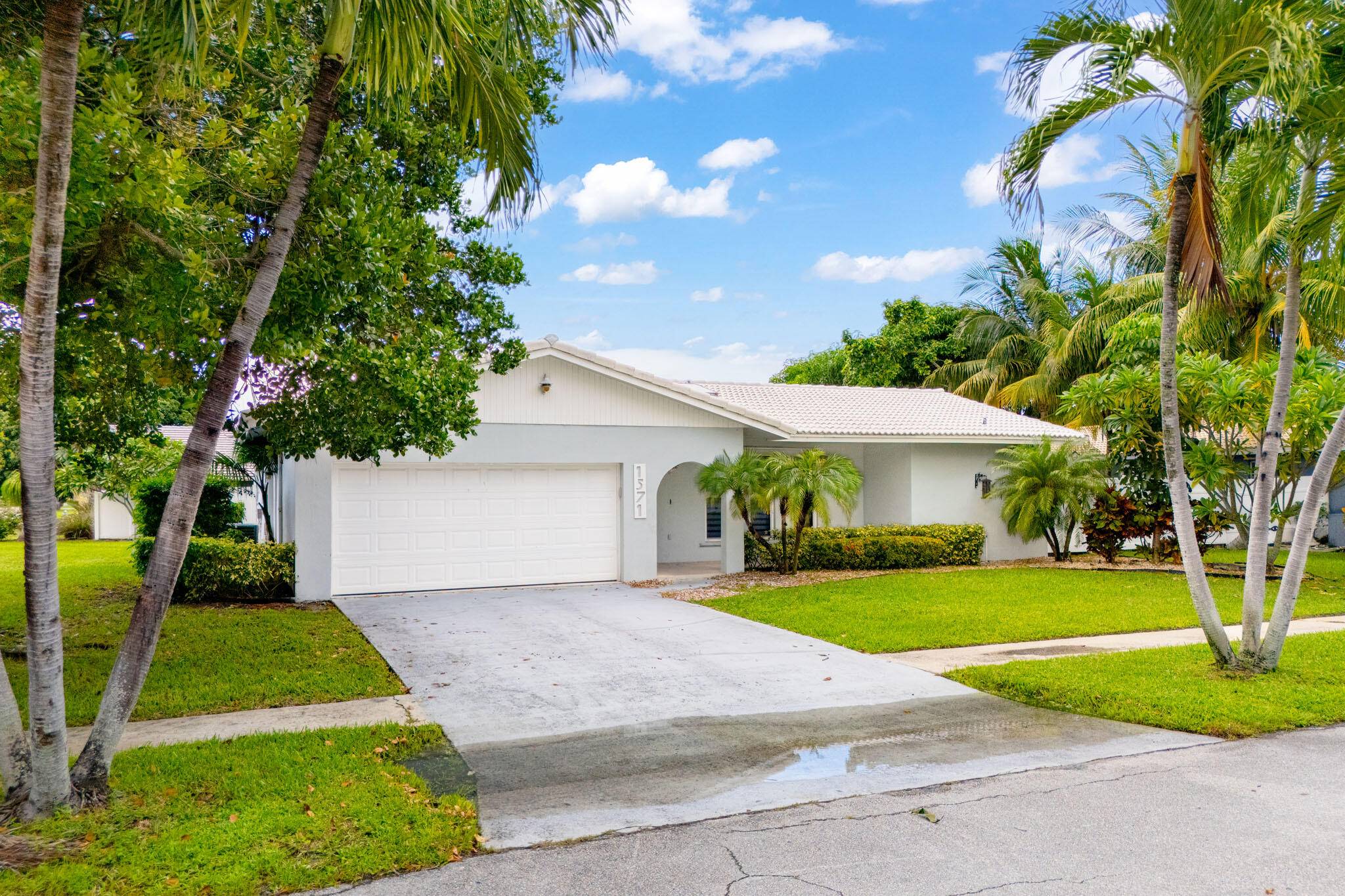 Nestled in the highly sought after community of Boca Raton Square, this home is a true gem offering both style and function.