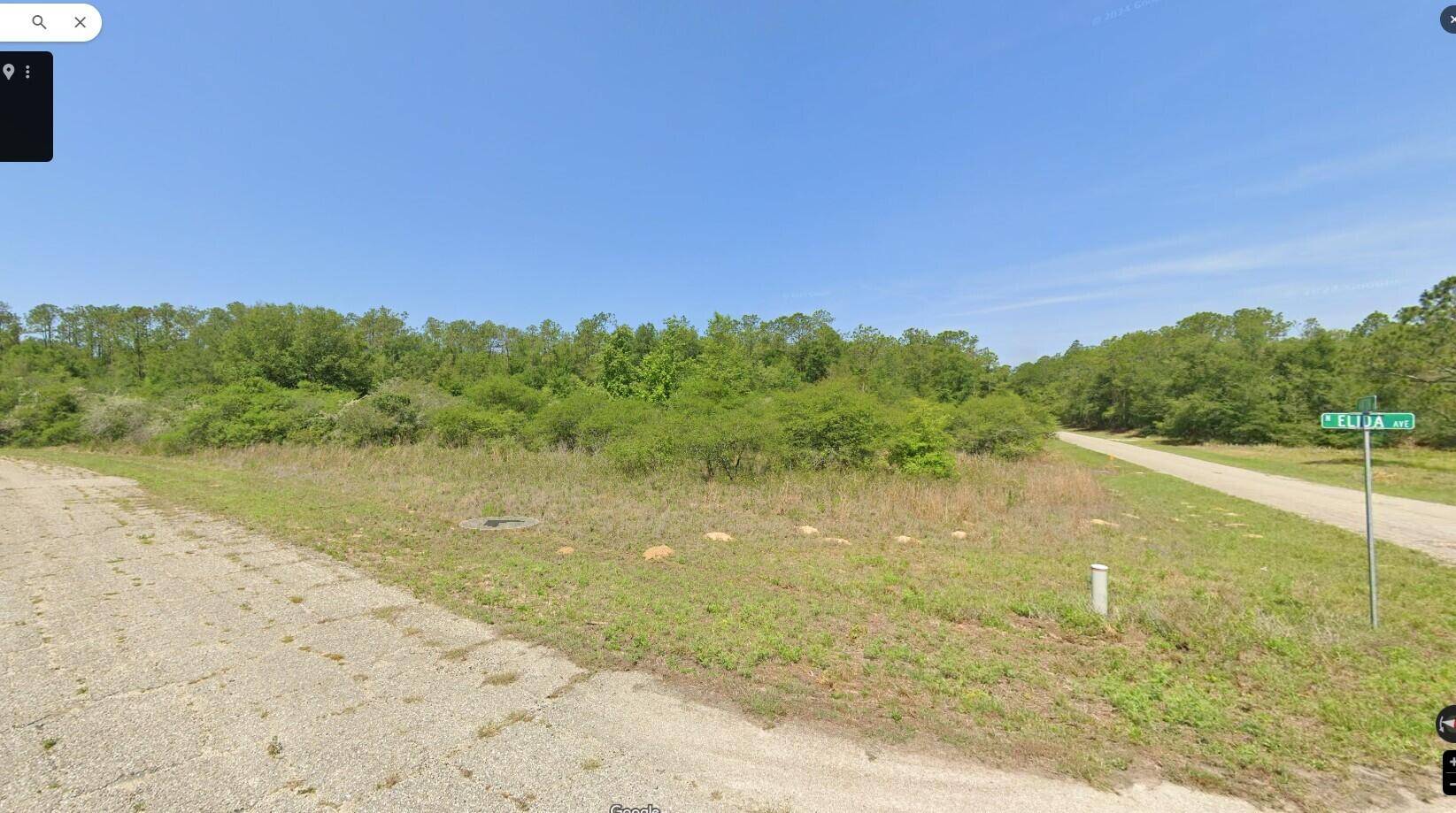 This parcel enjoys convenient access to a golf course and country club.